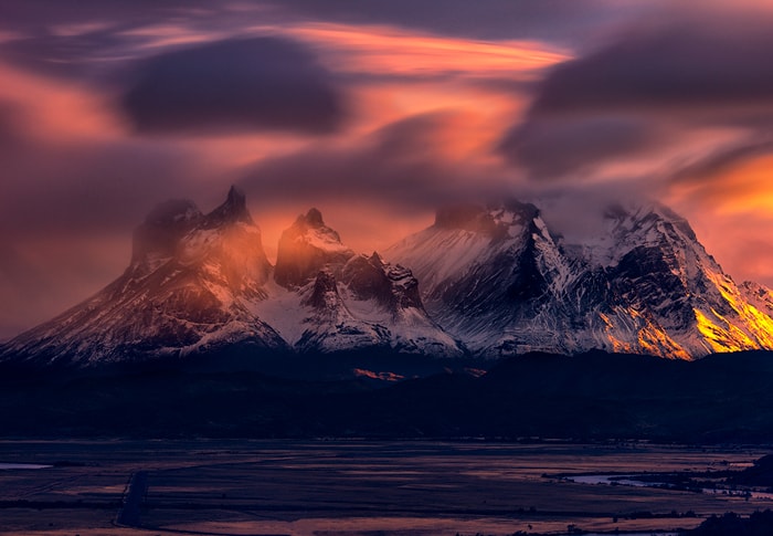 a long exposure shot at sunrise with a great backround of torres del paine
